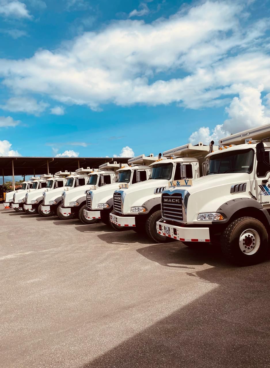 Mack tipper trucks lined up at the St. Helena yard